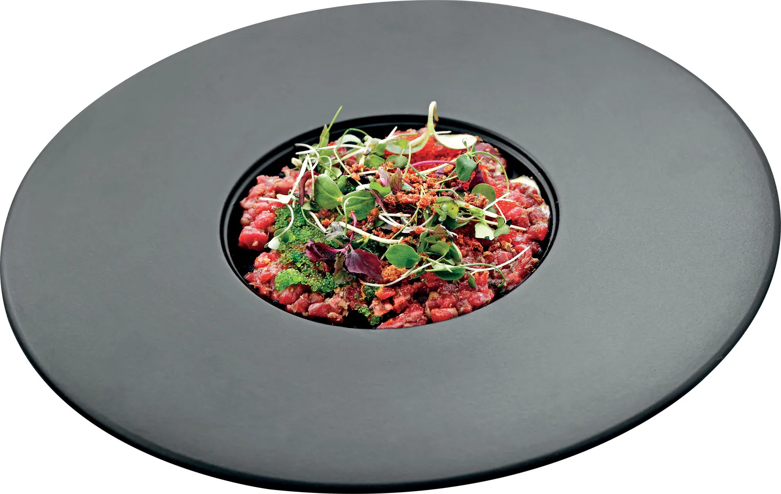 Tartare di manzo, capperi di Pantelleria, arancia e tobiko al wasabi sbriciolato